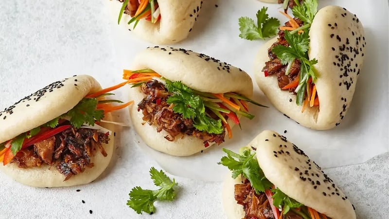 These Asian-inspired fluffy buns are filled with a sweet and sour jackfruit and crunchy salad.