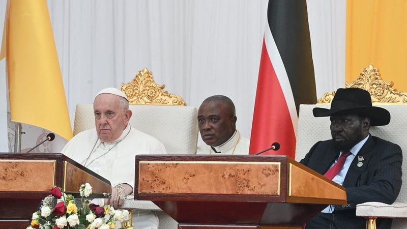 Pope Francis pictured alongside South Sudan's President Salva Kiir in the garden of the Presidential Palace in Juba
