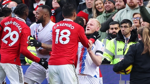 Casemiro clashes with Will Hughes of Crystal Palace