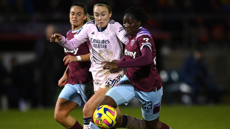 West Ham's Hawa Cissoko battles for possession with Caitlin Foord of Arsenal
