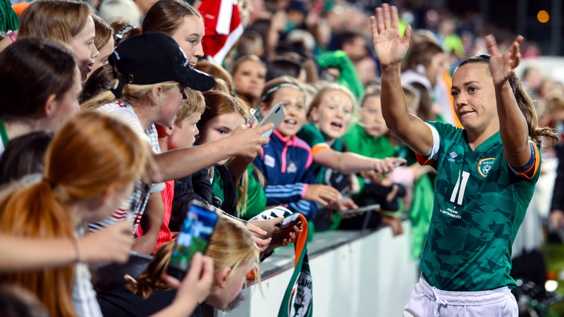 Katie McCabe mingles with fans after the win against Finland