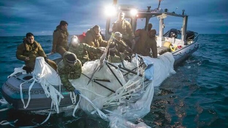 The US Navy released images of the balloon being picked up at sea after it was shot down