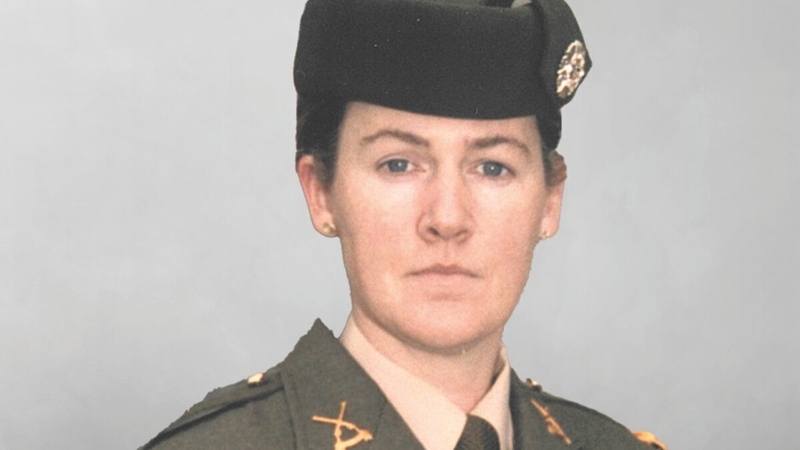 Karina Molloy, pictured on the cover of her new memoir A Woman In Defence