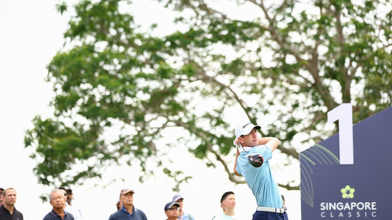 Tom McKibbin tees off from the first hole on his second round at the Singapore Classic