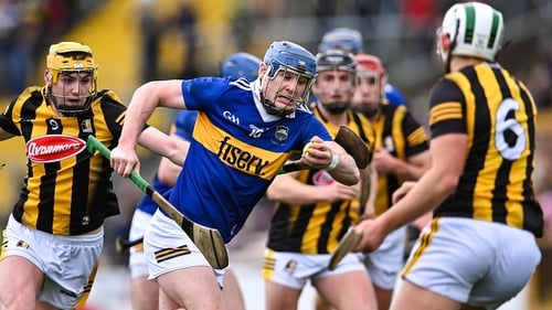 Alan Tynan of Tipperary in action against Kilkenny's Killian Doyle, left, and Pádraig Walsh