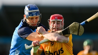 Conor Johnston of Antrim is tackled by Eoghan O'Donnell of Dublin