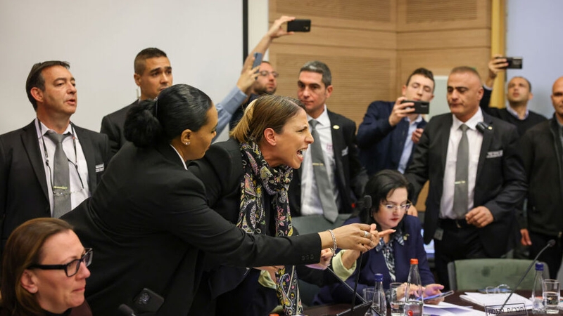 Opposition deputies protest inside the Knesset as the first stage of controversial judicial reform is approved by the Knesset Law Committee (Image: Knesset handout)