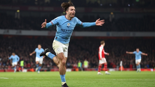Jack Grealish wheels away to celebrate his goal at the Emirates
