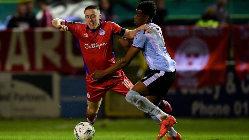 Shelbourne's Jack Moylan is tackled by Drogheda United's Elicha Ahui in the goalless encounter at Tolka Park