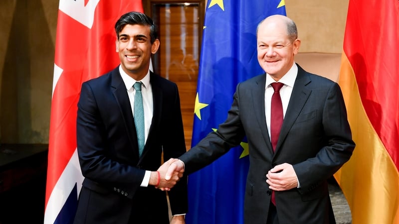 Rishi Sunak shakes hands with German Chancellor Olaf Scholz during their bilateral meeting at the 59th Munich Security Conference