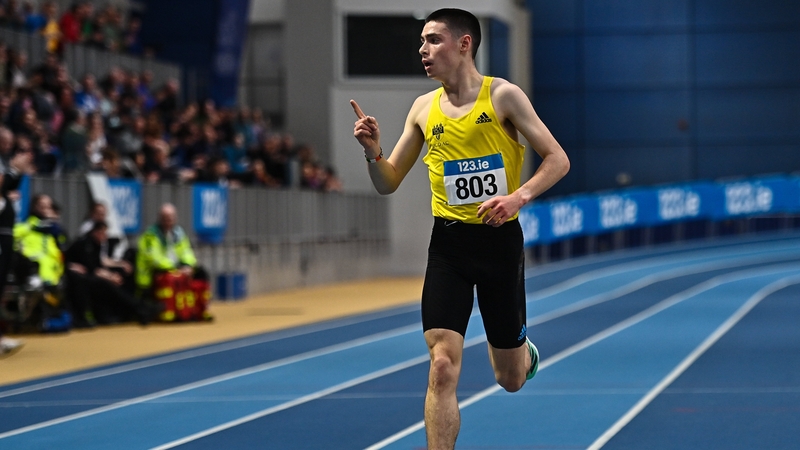Darragh McElhinney of UCD AC celebrates on his way to winning the senior men's 3000m