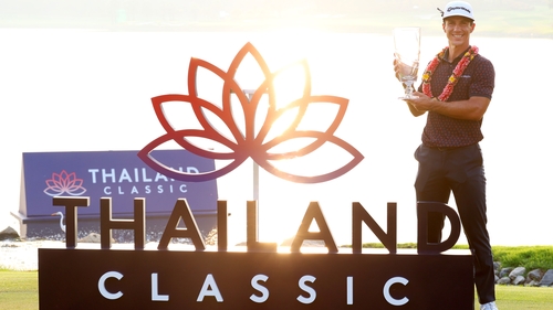 Thorbjorn Olesen of Denmark poses with the Thailand Classic Trophy