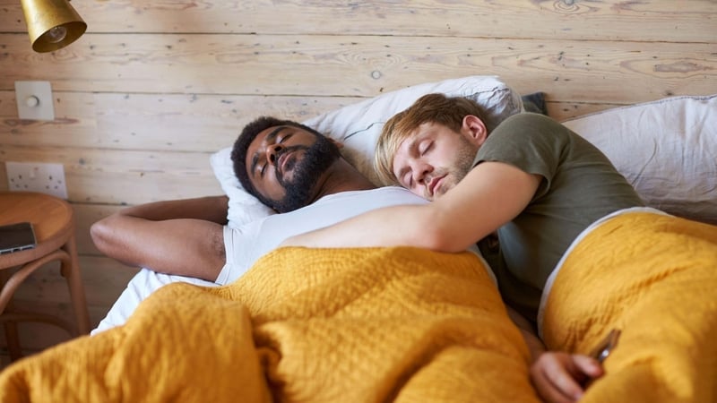 Experts consider the pros and cons of sharing a bed in relationships. By Imy Brighty-Potts.