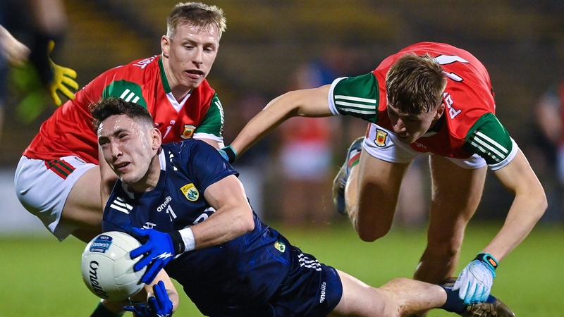 Paudie Clifford of Kerry is tackled by Ryan O'Donoghue and Donnacha McHugh