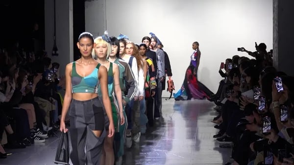 Designers from the war-torn country took to the runway before the first anniversary of the conflict on Friday.
