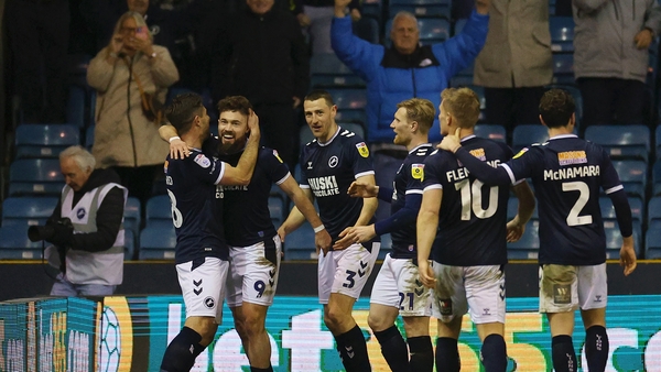 Tom Bradshaw (2nd left) takes the plaudits after his goal
