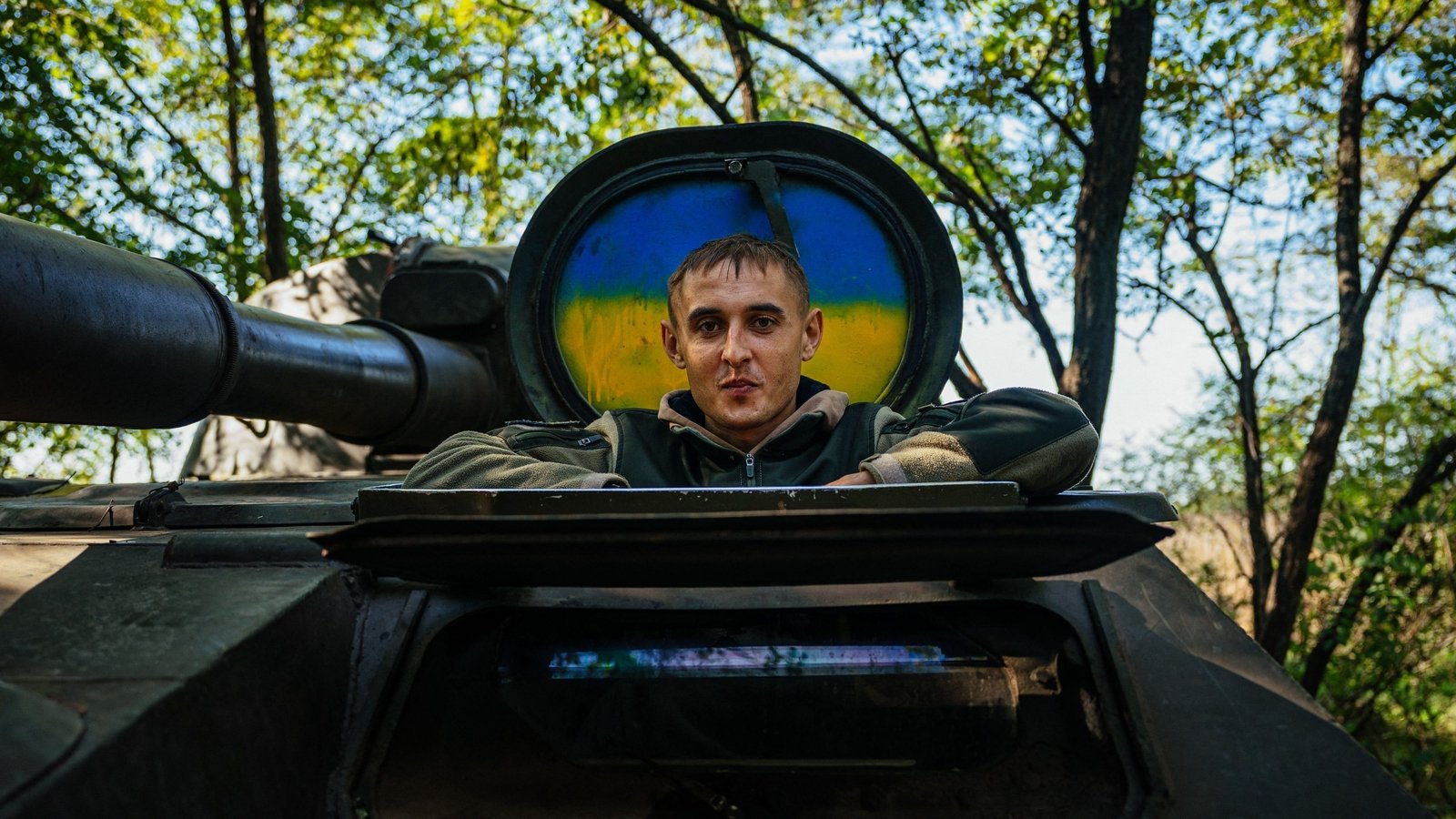 A Ukrainian gunner sits in his 2S1 Gvozdika on the front line in southern Ukraine on 8 October 2022.