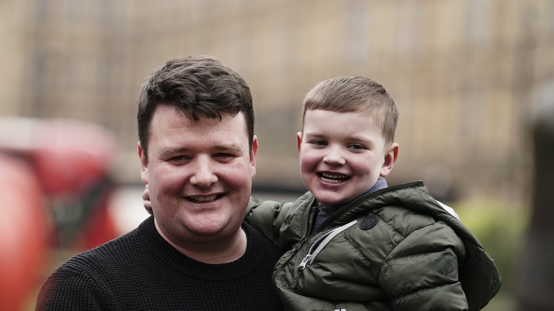 Daithi MacGabhann and his father Mairtin MacGabhann outside the Houses of Parliament in London