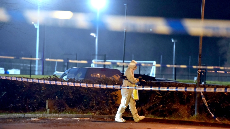 A forensics officer at the scene of a shooting in the Killyclogher Road area of Omagh
