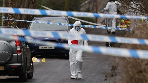 PSNI forensic officers at the scene of the shooting this morning