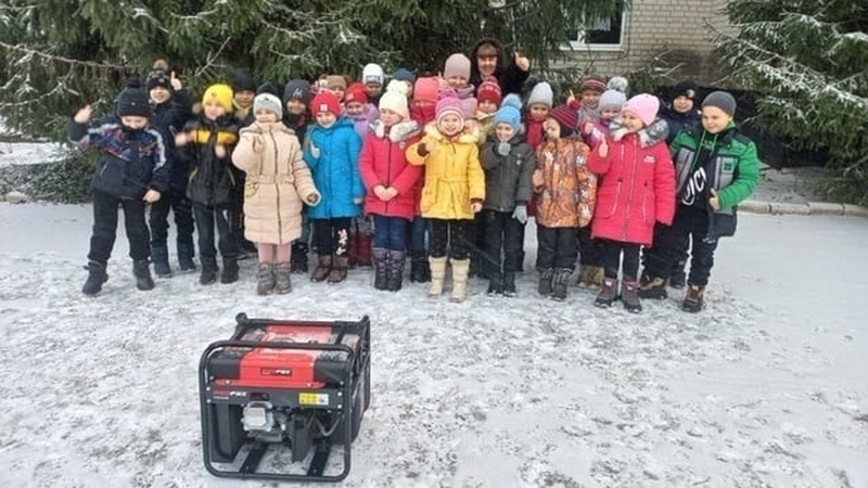 Children at school in Novyi Merchyk which can stay open because of a donation of generators from Ireland