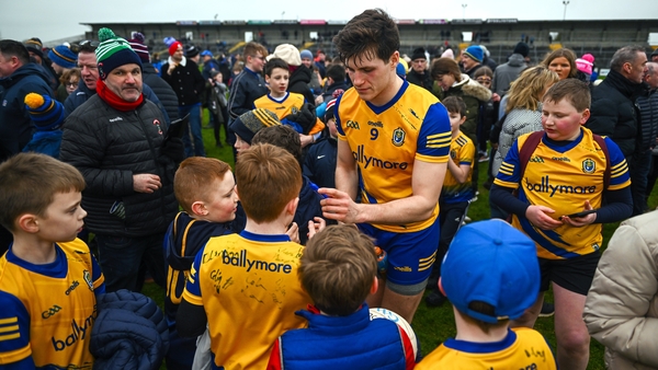 Keith Doyle of Roscommon signs autographs after the win over Armagh
