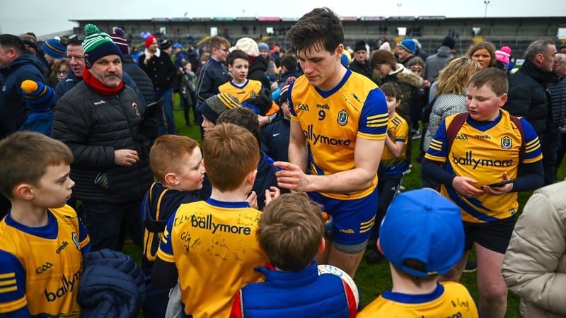 Keith Doyle of Roscommon signs autographs after the win over Armagh
