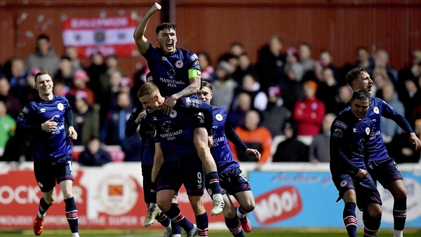 Eoin Doyle celebrates with teammate Joe Redmond after finding the net