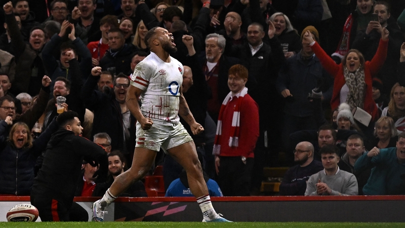 England's Ollie Lawrence celebrates his try