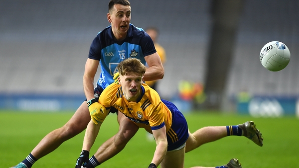 Dermot Coughlan of Clare in a battle for possession with Cormac Costello