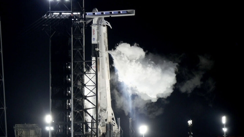 SpaceX Falcon 9 rocket with the Crew Dragon spacecraft sits on launch pad 39A after its launch was scrubbed