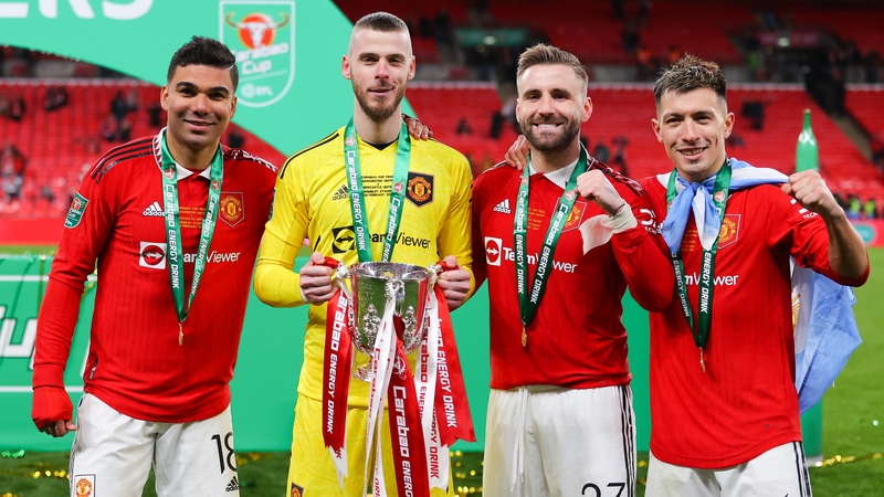 (L-R) Casemiro David De Gea, Luke Shaw and Lisandro Martinez and Casemiro Carabao Cup trophy
