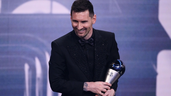 Lionel Messi cradles the latest trophy in an extraordinary career that has yielded so many