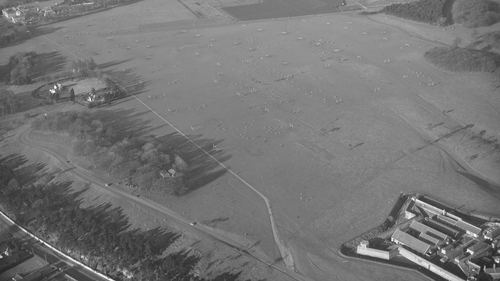 Is there a doctor in the house? An aerial view of a soccer match in the Fifteen Acres in Dublin's Phoenix Park in the 1950s. Photo: Alexander Campbell "Monkey" Morgan; Morgan Aerial Photographic Collection; National Library Of Ireland