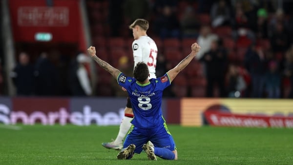 Gavan Holohan celebrates at the final whistle as Grimsby beat Southampton