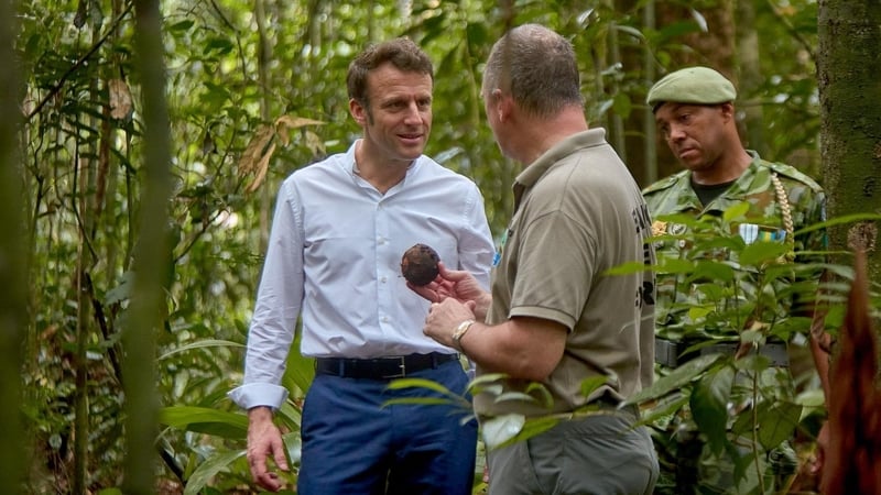Emmanuel Macron speaking to the Minister of Water, Forests, Sea and Environment of Gabon, Lee White, ahead of the One Summit (Image: Gabon ministry handout)
