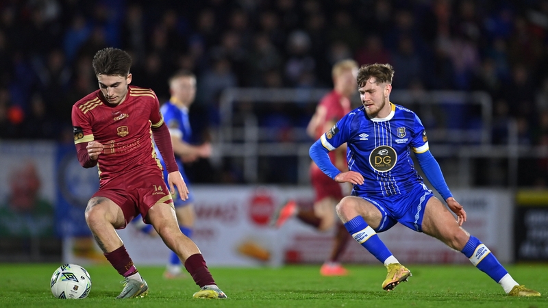 Ronan Manning of Galway United gets away from Barry Baggley of Waterford