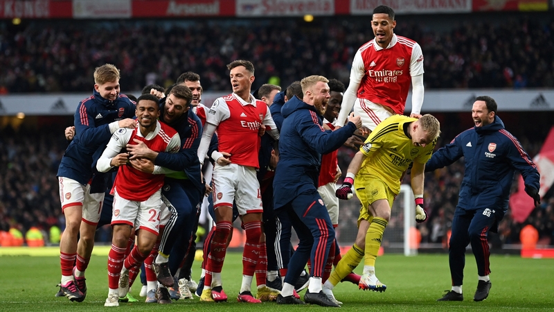 Arsenal players celebrate after Reiss Nelson's late, late winner