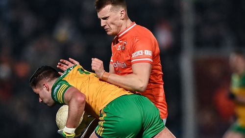 Rían O'Neill tackles Donegal's Brendan McCole
