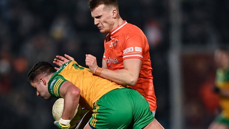 Rían O'Neill tackles Donegal's Brendan McCole