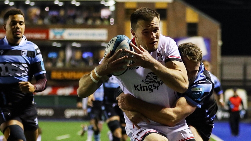 Jacob Stockdale scores Ulster's second try despite the efforts of Max Llewellyn