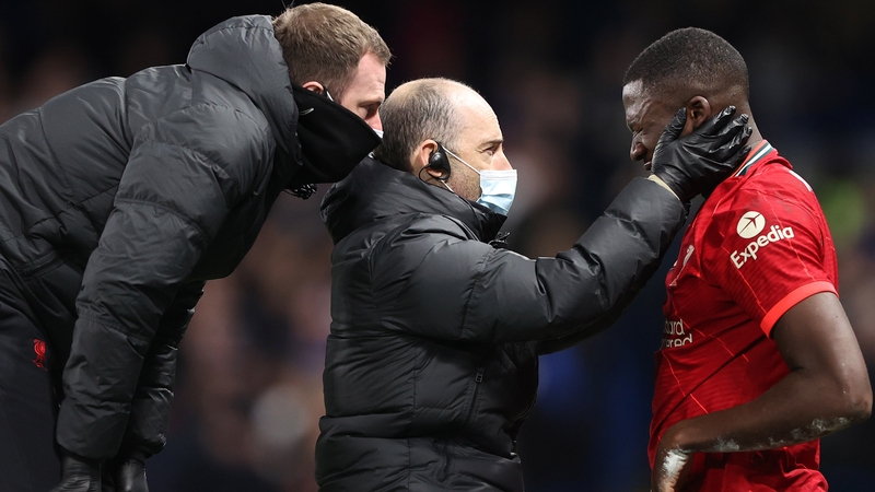 The Liverpool physios assess Ibrahima Konate during a Premier League game against Chelsea last season