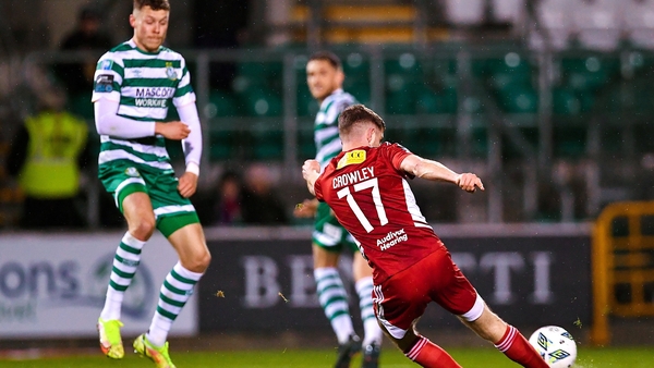 Darragh Crolwey takes aim to score from just inside the Rovers half