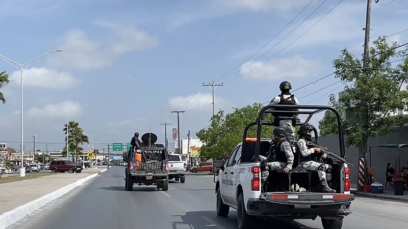 Mexican National Guard and military vehicles take part in an operation to transfer two of the four Americans back to Brownsville in the US