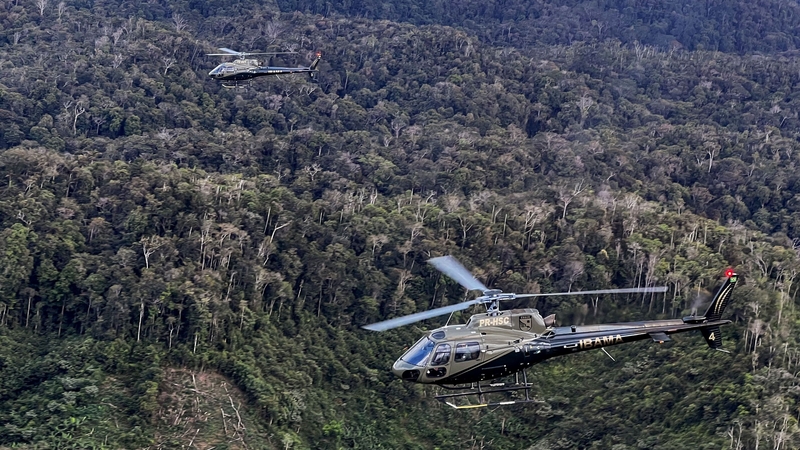 Brazilian authorities taking part in an operation against Amazon deforestation at an illegal mining camp in Roraima State