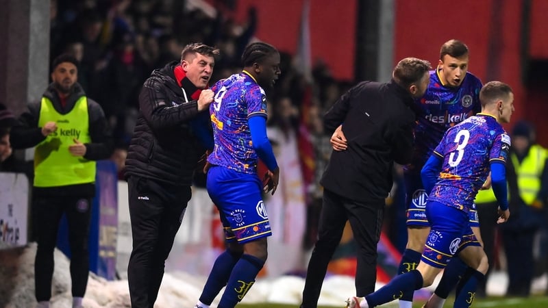 Declan Devine congratulates Jonathan Afolabi after Bohemians' opener against St Pat's
