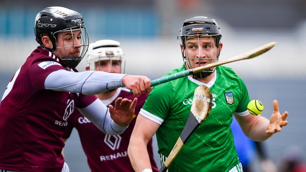Peter Casey of Limerick tries to get past Gary Greville