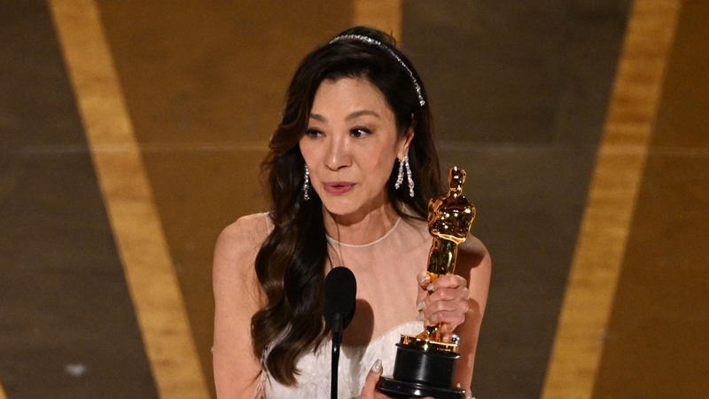 Michelle Yeoh accepts her Best Actress Oscar