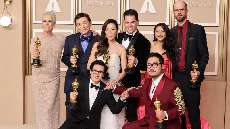 Jamie Lee Curtis, James Hong, Ke Huy Quan, Michelle Yeoh, Jonathan Wang, Daniel Kwan, Stephanie Hsu, and Daniel Scheinert, winners of the Best Picture award for Everything Everywhere All at Once