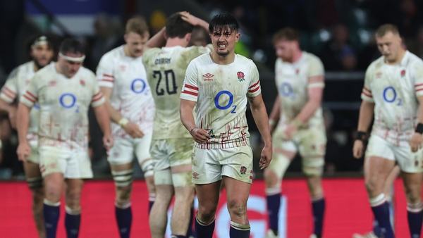 Marcus Smith grimaces during the England horror show against France